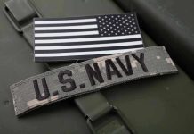 U.S. Navy patch with black-and-white American flag.