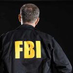 LEAKED Files, Convenient Resignation — FBI Knew FBI agent with back facing the camera.