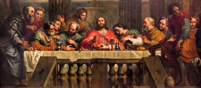 Jesus and disciples seated at a long table.