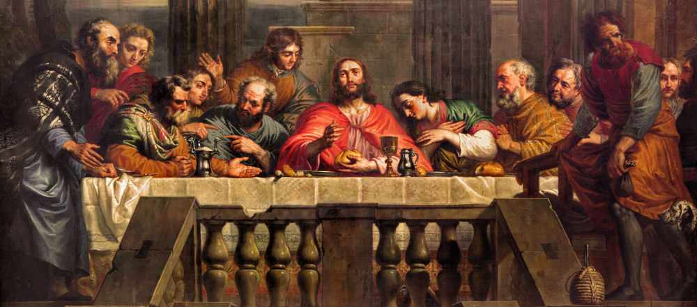 Jesus and disciples seated at a long table.