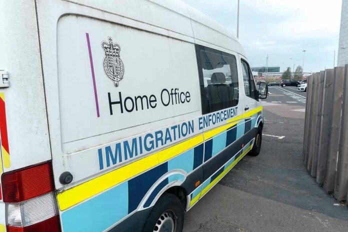 2212785583 White immigration enforcement van parked by roadside