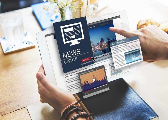 Person reading digital news on a tablet device