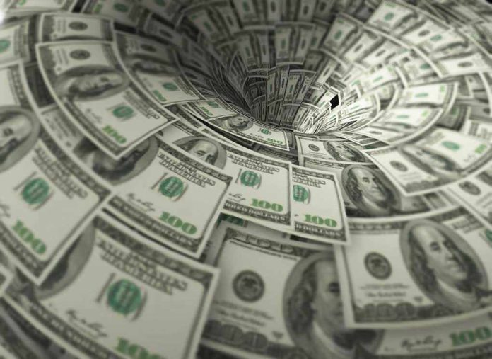 Hundred-dollar bills swirling into a financial vortex.