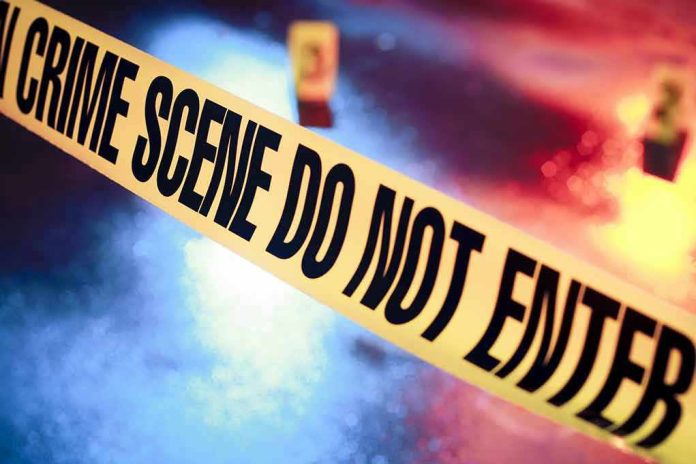 92369299 Crime scene tape with do not enter text.