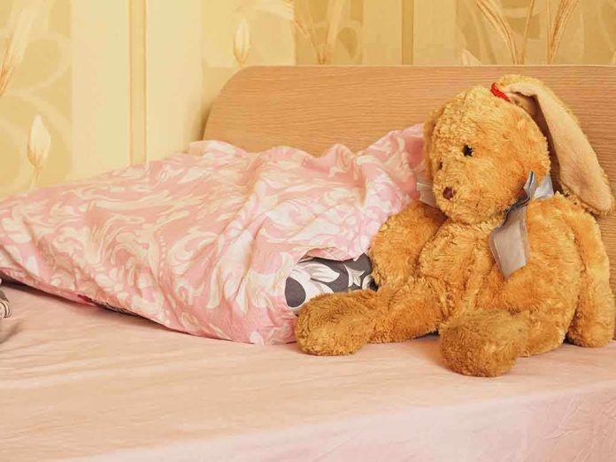 A cozy bedroom scene featuring a stuffed bunny and pink bedding