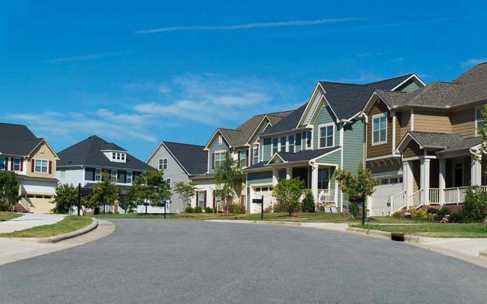 470746946 Suburban street with colorful, modern houses.
