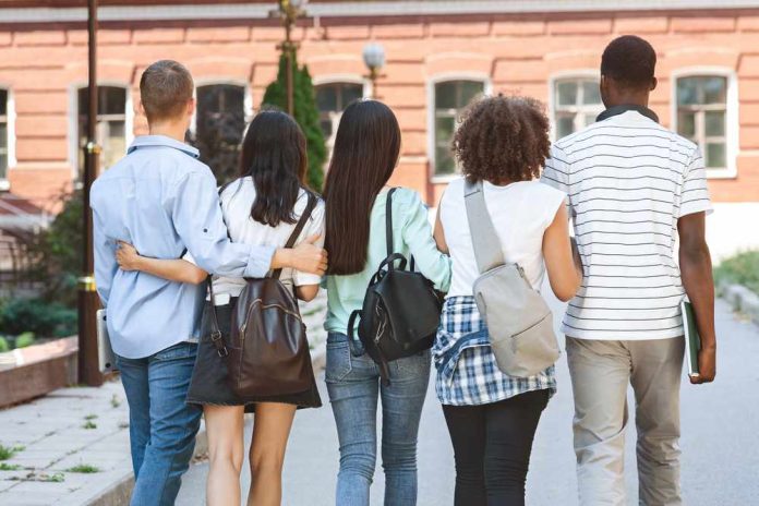 shutterstock_1750551107 Group of students walking together on campus