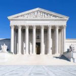 SCOTUS Denies Last-Minute Death Row Plea The Supreme Court building featuring marble columns and a clear blue sky