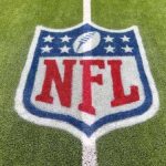 NFL Phenom Dead at 36! NFL logo painted on a football field