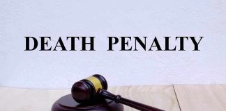 Gavel with Death Penalty text background.
