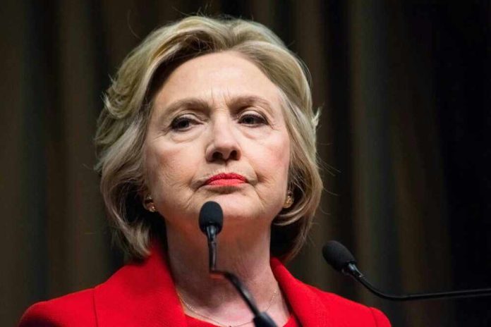 shutterstock452029942jpg Hillary Clinton behind microphones.