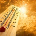 Hundreds HOSPITALIZED In Heatwave Disaster A thermometer displaying temperature against a sunset sky