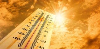 Hundreds HOSPITALIZED In Heatwave Disaster A thermometer displaying temperature against a sunset sky