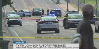 National Guard Member Shoots 20-Year-Old Armed Man AP: Autopsy shows National Guard shot Tyrin Johnson in the back