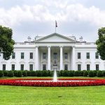 The White House with fountain and red flower bed