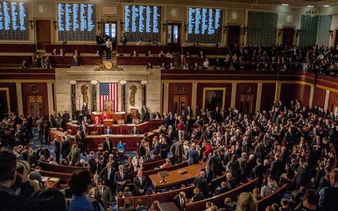 shutterstock_1186368286 House chamber filled with lawmakers during a session
