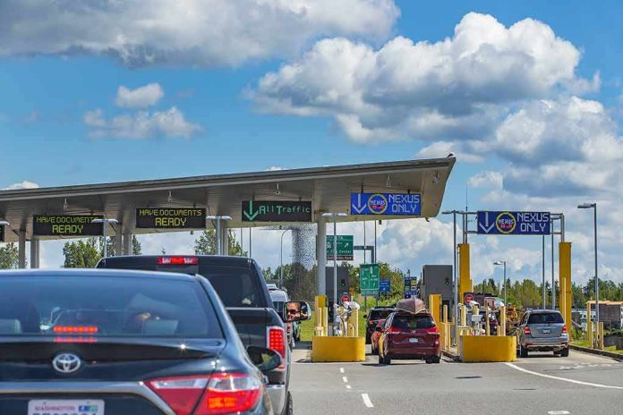 Vehicles queue at a border crossing checkpoint