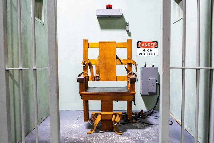 shutterstock_1949928943 electric chair in a prison execution chamber
