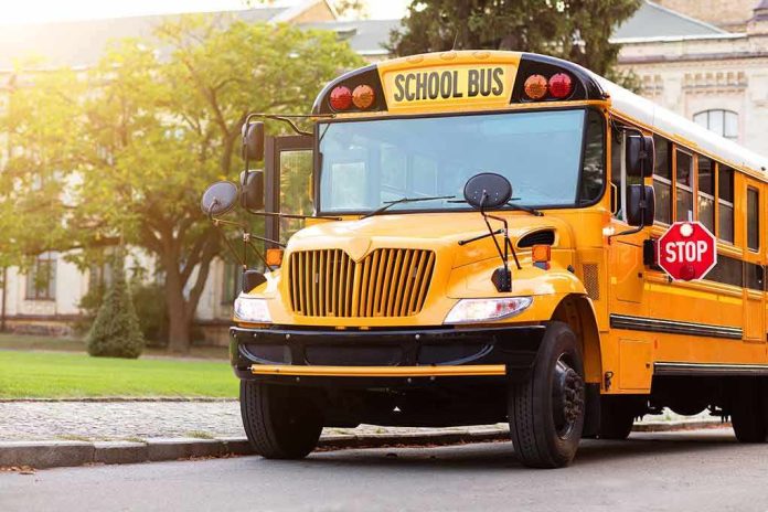 Yellow school bus with stop sign extended