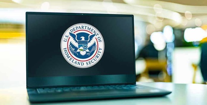Laptop displaying U.S. Department of Homeland Security logo.