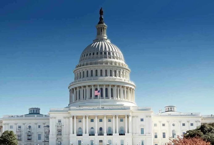 United States Capitol building with dome under clear blue sky