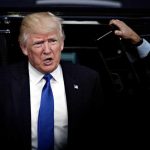 MAGA Senator BLASTS Trump for Spending Public Money on TV Ads Donald Trump stepping out of a vehicle in a suit and blue tie
