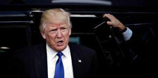 MAGA Senator BLASTS Trump for Spending Public Money on TV Ads Donald Trump stepping out of a vehicle in a suit and blue tie