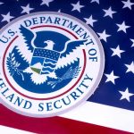 DHS Wrongly Deports Teenager TWICE! U.S. Department of Homeland Security seal on American flag