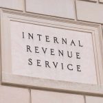 Internal Revenue Service building sign on a stone wall