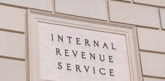 IRS Replaces THOUSANDS Of Agents With One App Internal Revenue Service building sign on a stone wall
