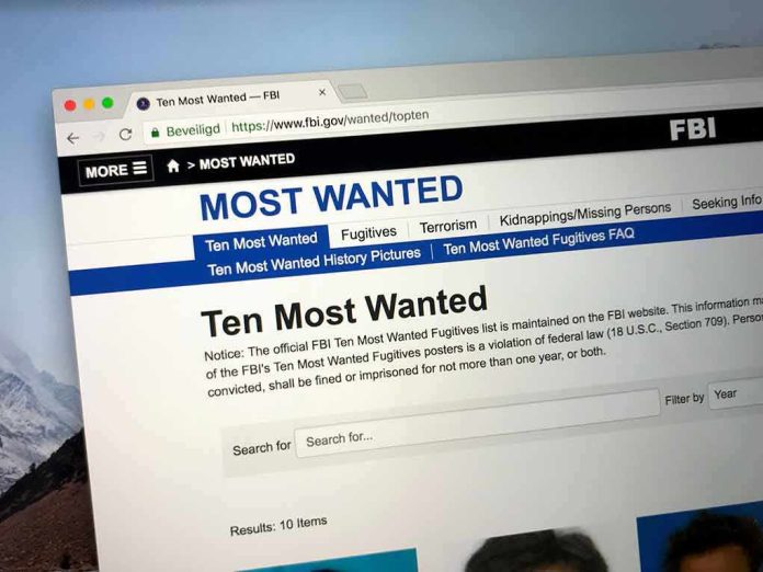 shutterstock_1163296018 Computer screen showing an FBI Most Wanted webpage