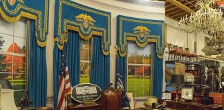 Oval Office-style desk and decor in a museum display