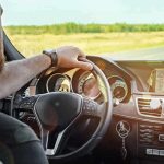 2.9M Vehicles Recalled – Steering SNAPS! Driver's hands on steering wheel of car interior