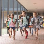 Commie Mamdani’s Staffers Salaries EXPOSED! Group of schoolchildren running down a hallway