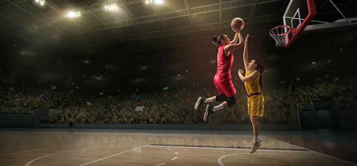Two women playing basketball; Michelle Jenneke is not visible