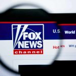 Fox News website logo under magnifying glass