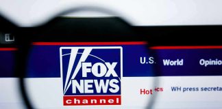 Fox News website logo under magnifying glass
