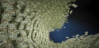 Tornado of US dollar bills swirling into a vortex