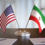 Trump REJECTS Irans Proposal – Doubles Down United States and Iran desk flags on a stand
