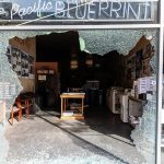 Jewish Bakery GUNNED DOWN In Hate Attack Shopfront with large shattered glass window opening into print shop