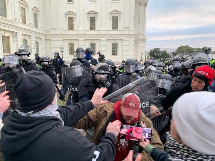 Dontrelle Inman among protesters and police in riot gear outside a government building