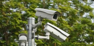 surveillance cameras mounted on a metal pole