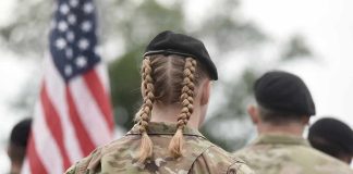 Leaders Panic Over Hegseth’s Military Plans for the Region soldier in camouflage with braided hair and beret