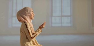 Tax-Funded Ramadan Sparks Lawsuit – OUTRAGE! Woman in hijab praying on a mat indoors