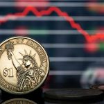NEW $1 Coins Released – See Them Here! U.S. dollar coin in front of falling stock chart