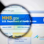 Trump Freezes Homeless Funds After THIS Happened! Magnifying glass over HHS.gov website header