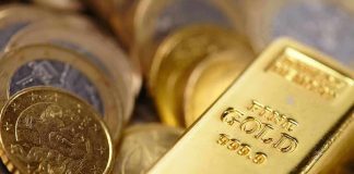 Gold bar and coins close-up