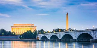 Arlington Memorial Bridge with Lincoln Memorial and Washington Monument at dusk