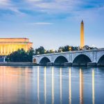 CNN Host Grills Trump Official on Bizarre Reflecting Pool Claim Arlington Memorial Bridge with Lincoln Memorial and Washington Monument at dusk