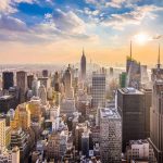 Manhattan skyline at sunset with dense skyscrapers